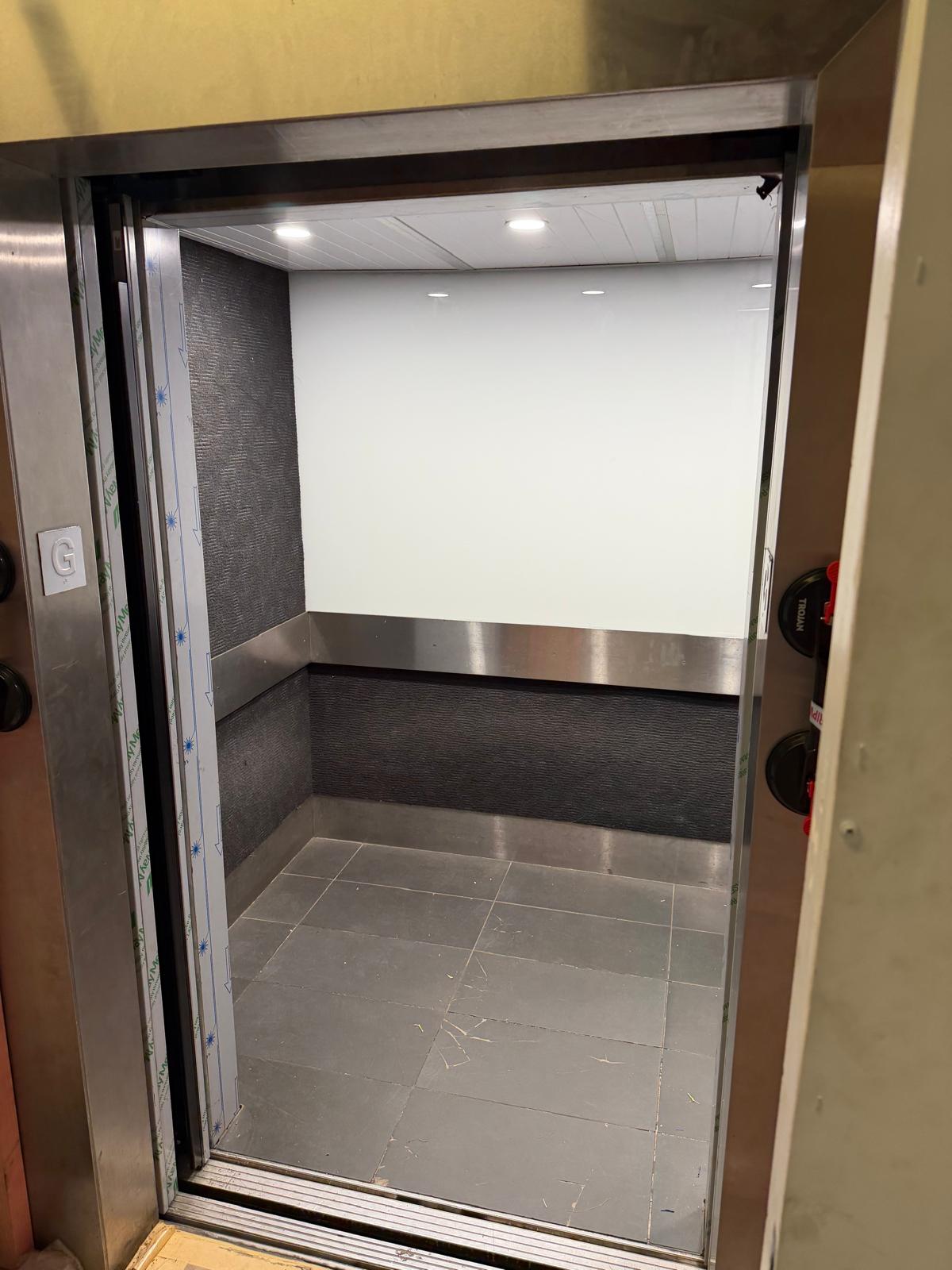 Lift interior and entrance with new lighting